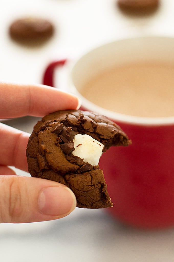 Miniature Hot Chocolate cookie with a bite out of it. 