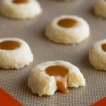 Classic shortbread thumbprint cookies with delicious homemade butterscotch filling. From BakingMischief.com