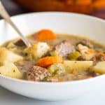 Simple beef stew in a white bowl.