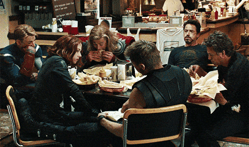 GIF of The Avengers eating shawarma.