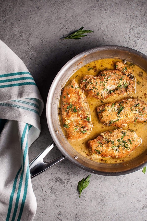 Chicken Francese in a pan.