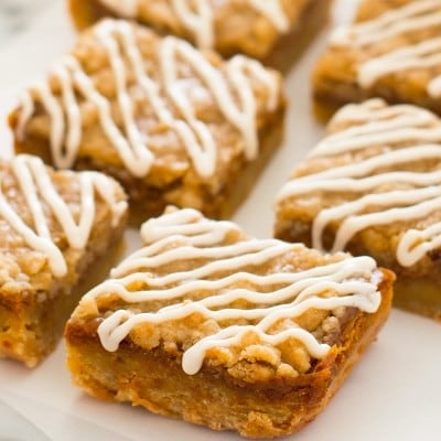 These small-batch Shortbread Pumpkin Pie Bars are everything you love about pumpkin pie, but with an easy shortbread base, crunchy streusel topping, and sweet cream drizzle! Recipe includes nutritional information. From BakingMischief.com