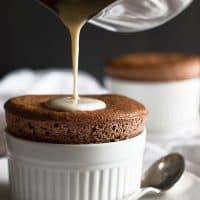 Chocolate Souffles for Two with Creme Anglaise are a perfect make ahead date night dessert. From BakingMischief.com