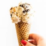 This No-churn Peanut Butter Oreo Ice Cream is creamy homemade vanilla ice cream with swirls of peanut butter, chunks of Oreos, and Reese's Peanut Butter Cups Minis throughout. What could be better?