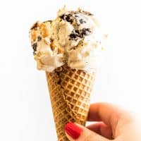 This No-churn Peanut Butter Oreo Ice Cream is creamy homemade vanilla ice cream with swirls of peanut butter, chunks of Oreos, and Reese's Peanut Butter Cups Minis throughout. What could be better?