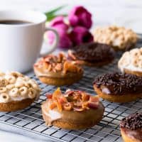 Choose your own adventure with these moist and delicious one-bowl baked donuts that you can make three ways: Maple Bacon Donuts, Milk and Cereal Donuts, or Coffee and Chocolate Donuts!