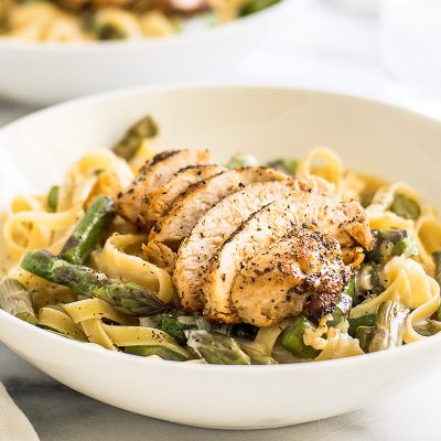 This easy Creamy Chicken and Asparagus Pasta is quick and simple to make and perfect for nights when you need a cheesy pasta fix!