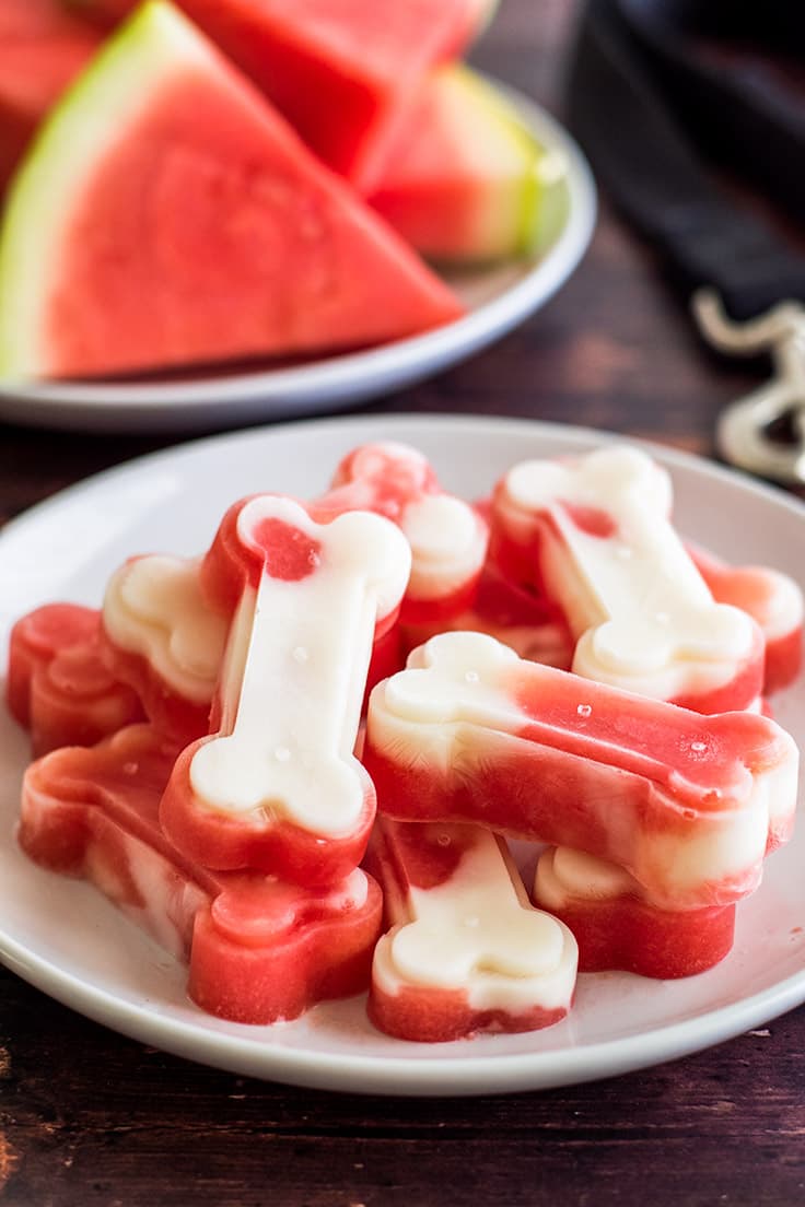 Make a big batch of these two-ingredient Watermelon and Yogurt Frozen Dog Treats to keep your pup cool this summer!
