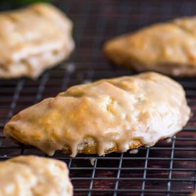 Small-batch apple hand pies on a cooling rack.