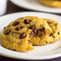 These Small-batch Chocolate Chip Pumpkin Cookies are soft and chewy with plenty of pumpkin spice flavor, like the perfect chocolate chip cookie all dressed up for fall. | #cookies | #pumpkinspice | #falldesserts |