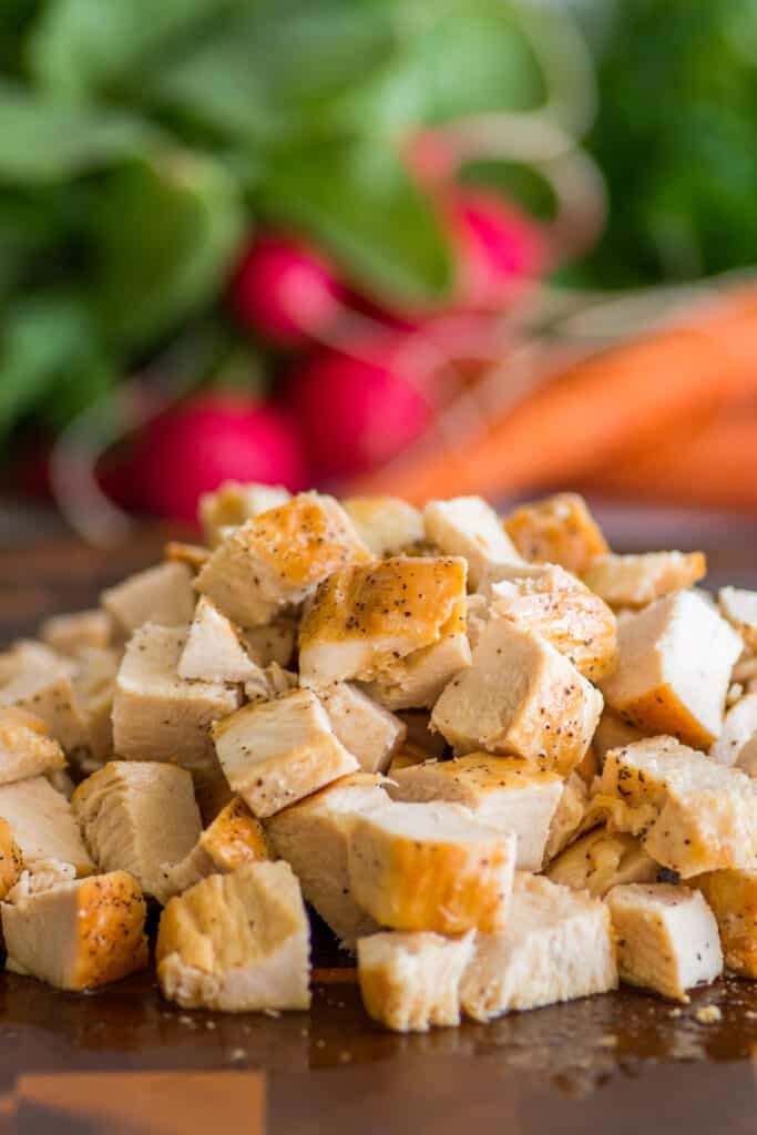 Photo showing how to cook chicken breasts in a pan.