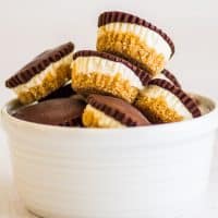 Square photo of No-bake Cheesecake Bites with Graham Cracker Crust in a bowl.