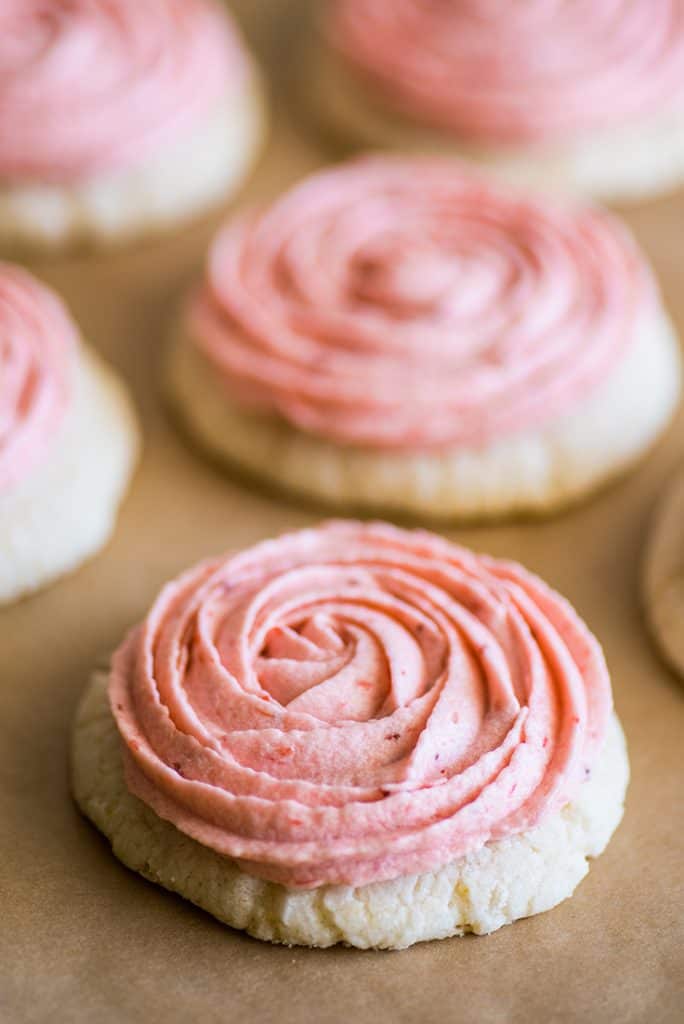 Image of Strawberry buttercream frosting on sugar cookies.
