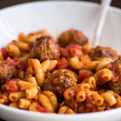 Photo of Homemade Spaghettios in a white bowl.
