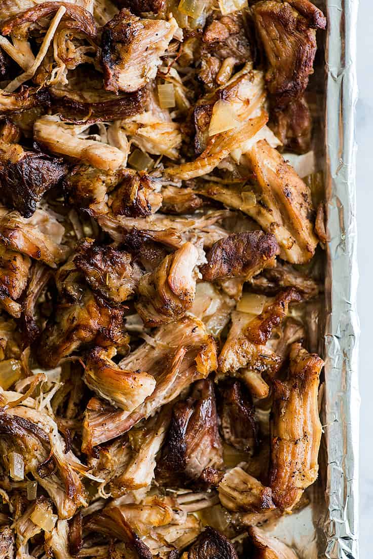 Crispy Slow Cooker Carnitas on a baking tray.