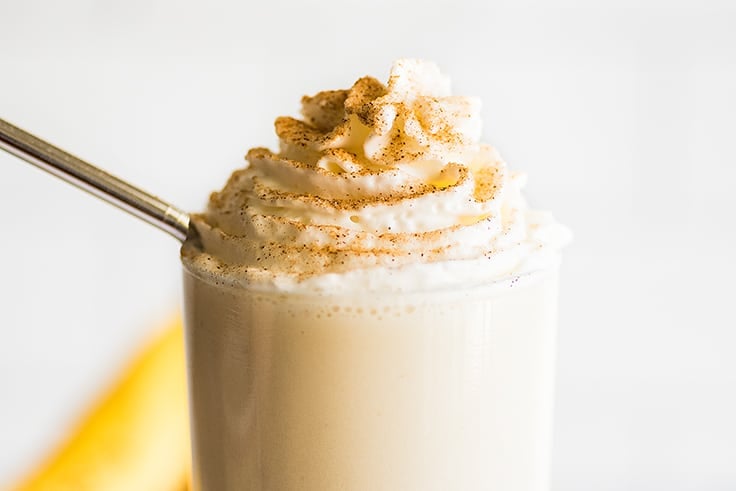 Banana milkshake with whipped cream and cinnamon sugar.