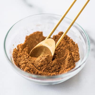 Homemade pumpkin pie spice mix in a glass bowl.
