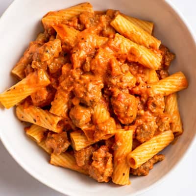 Creamy sausage pasta sauce over rigatoni pasta.