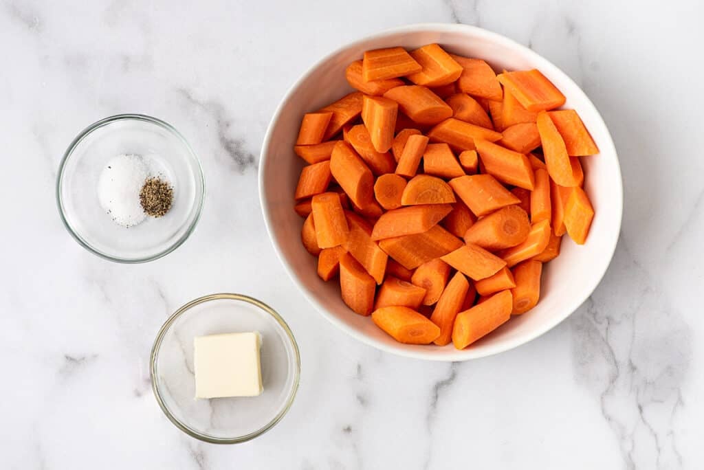 Ingredients for roasted carrots on a counter.
