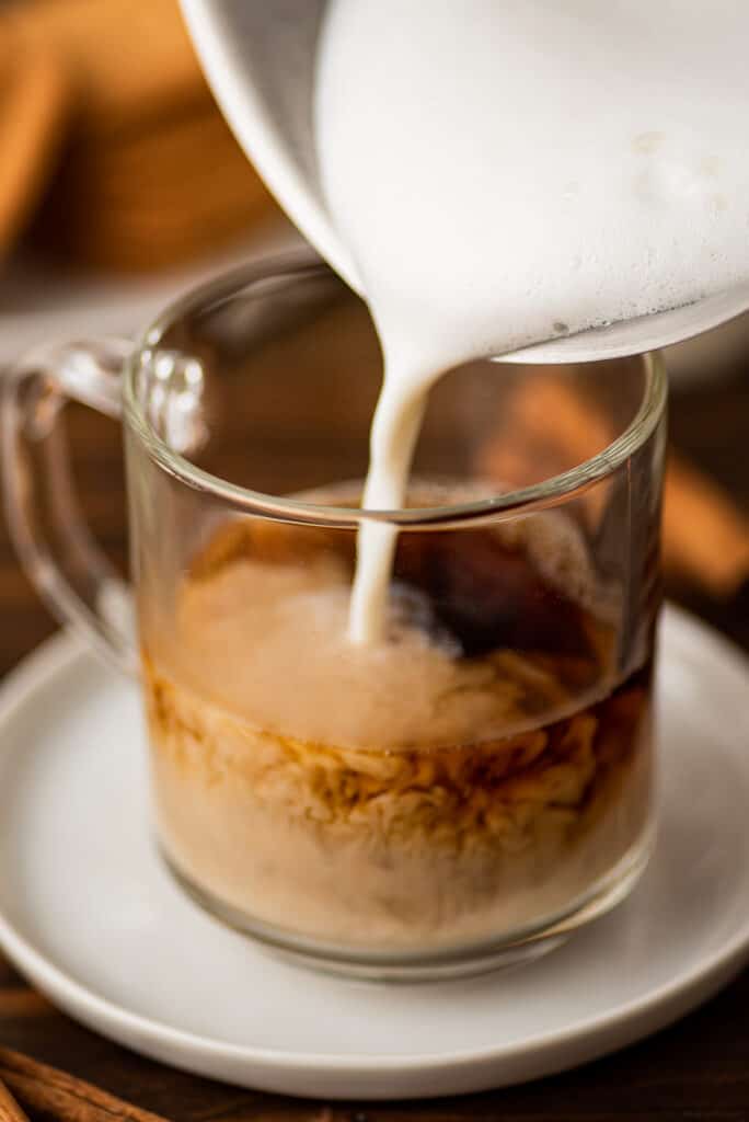 Cinnamon dolce latte being made.