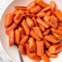 close up overhead shot of a bowl of honey roasted carrots