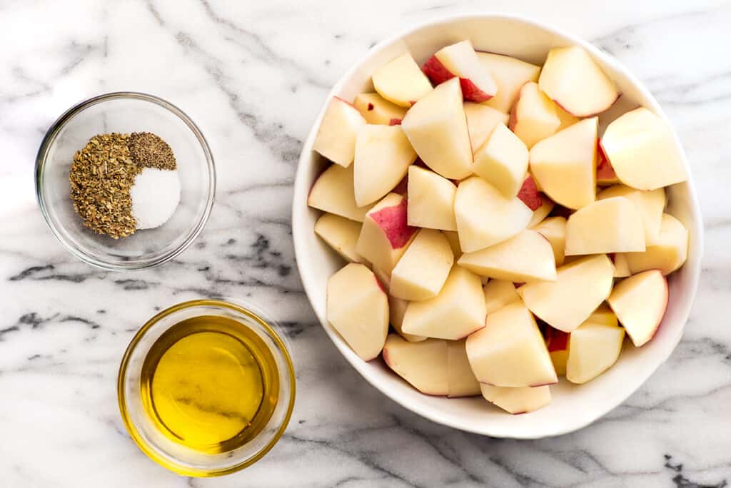 Italian roasted potato ingredients on a counter.