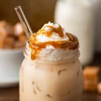 Iced caramel latte in a mason jar.