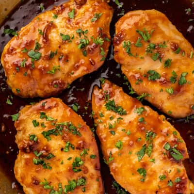 Honey garlic chicken in a pan.
