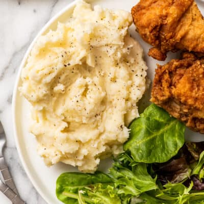 Microwave mashed potatoes on a plate.