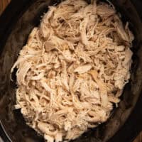 a slow cooker of shredded chicken