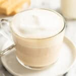 a coffee cup of london fog latte on a plate