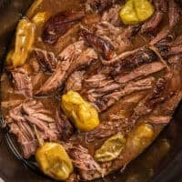 a slow cooker of mississippi pot roast with pepperoncinis